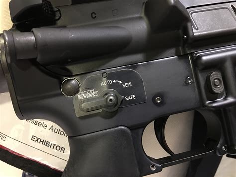The hammer will follow the bolt forward if you hold the trigger back. . M16 full auto selector switch